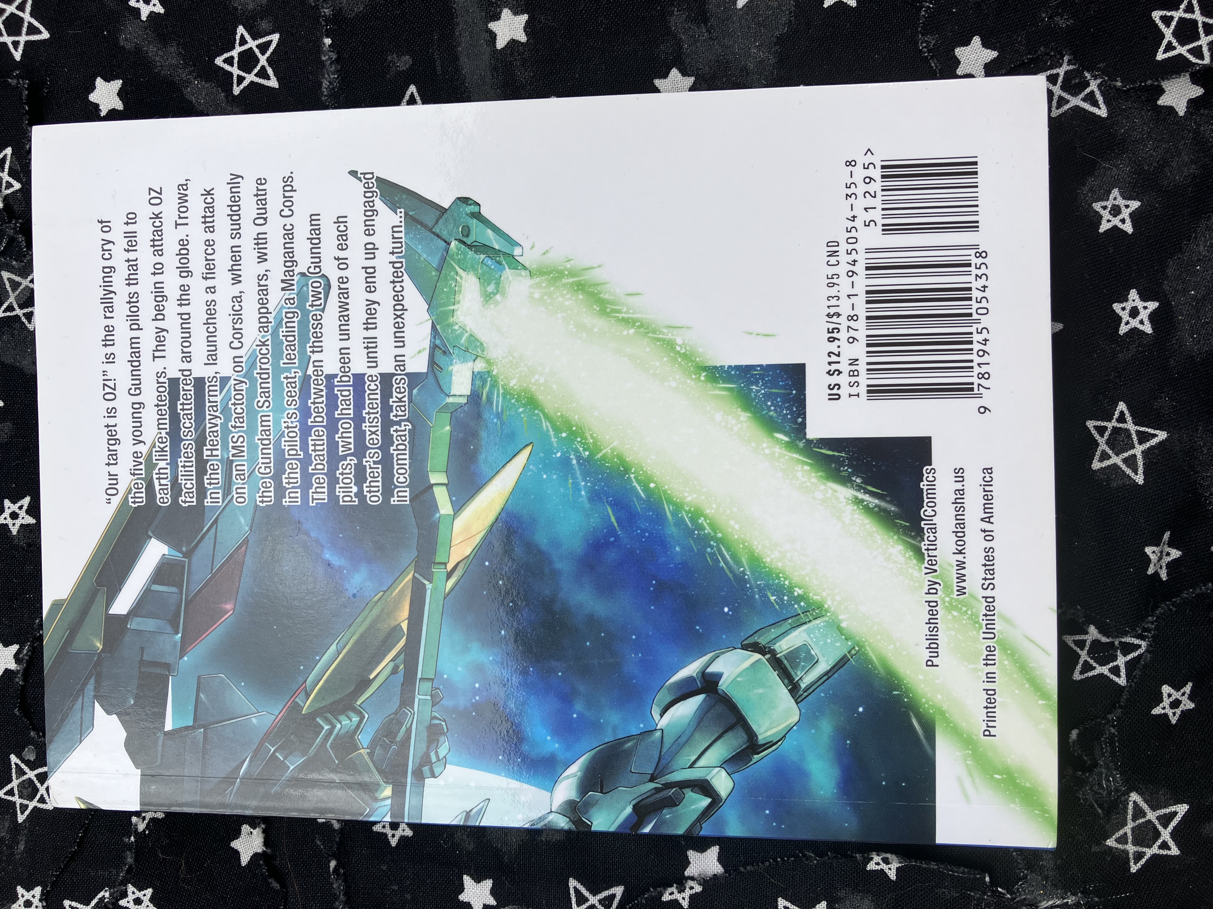Back of Mobile Suit Gundam WING 2: Glory of the Losers with Deathscythe's weapon and manga summary on it.